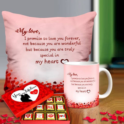 Valentine gift set featuring premium chocolates, a romantic printed mug, and a soft cushion – perfect for expressing love to your partner.