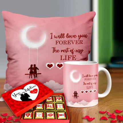 Valentine gift set featuring premium chocolates, a romantic printed mug, and a soft cushion – perfect for expressing love to your partner.