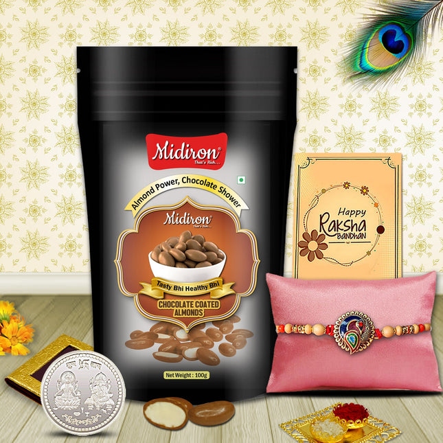 Rakhi gift combo with luxurious treats — chocolate almonds, roli-chawal, silver coin, and heartfelt greeting card for brother.