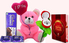 Pink teddy bear with 'I Love You' heart, Cadbury Chocolates, rose, and Karwa Chauth card
