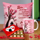 Valentine gift set featuring premium chocolates, a romantic printed mug, and a soft cushion – perfect for expressing love to your partner.
