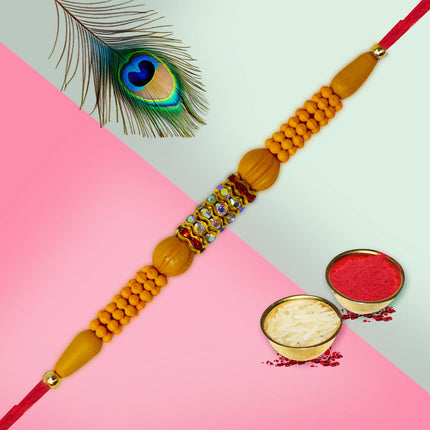 Raksha Bandhan Heritage Gift Box – Designer Rakhi in Wooden Box, Chocolates Pouch (90g), Greeting Card & Ritual Kit