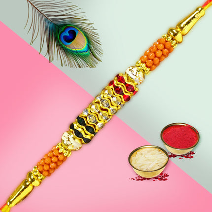 Handcrafted Rakhi featuring a regal design with gold accents, ideal for celebrating the bond of sibling love.