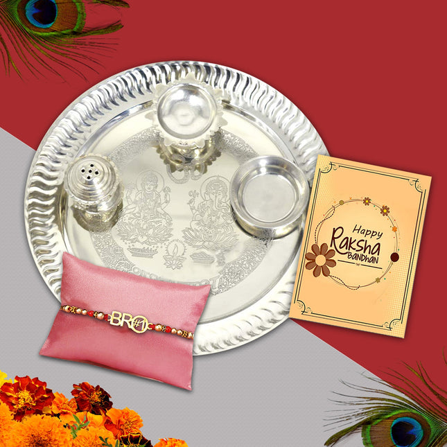 Rakhi gift box capturing the spirit of tradition with pooja plate, roli-chawal, designer Rakhi, and greeting card.