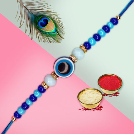 Stunning Rakhi featuring twilight-toned threads and a shimmering star charm, symbolizing eternal protection and love between siblings.