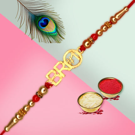 Rakhi crafted with Zari work and shimmer thread, adding a touch of glamour to tradition.